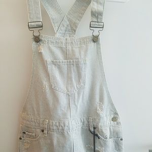 Very cute distressed pinstripe denim overalls.